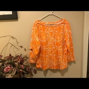 Orange and white 3/4 sleeve tee.