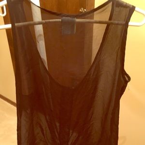 Sheer black tank tied at bottom