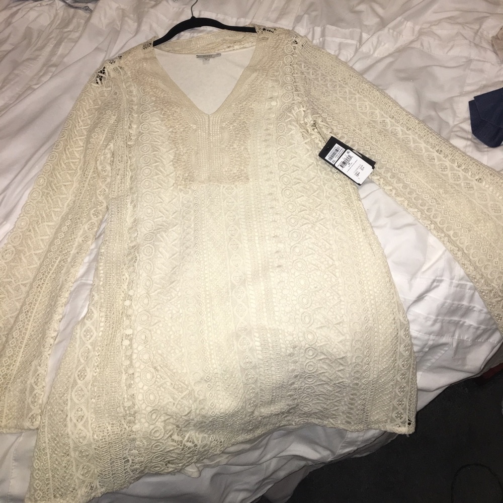 Cream colored bell sleeves dress