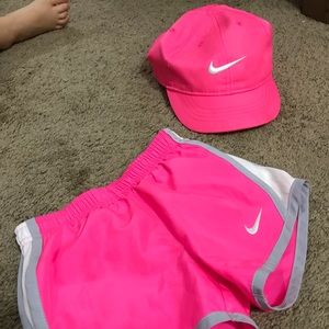 Nike hat and Dri fit shorts