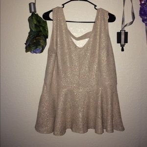 Sparkly gold peplum top