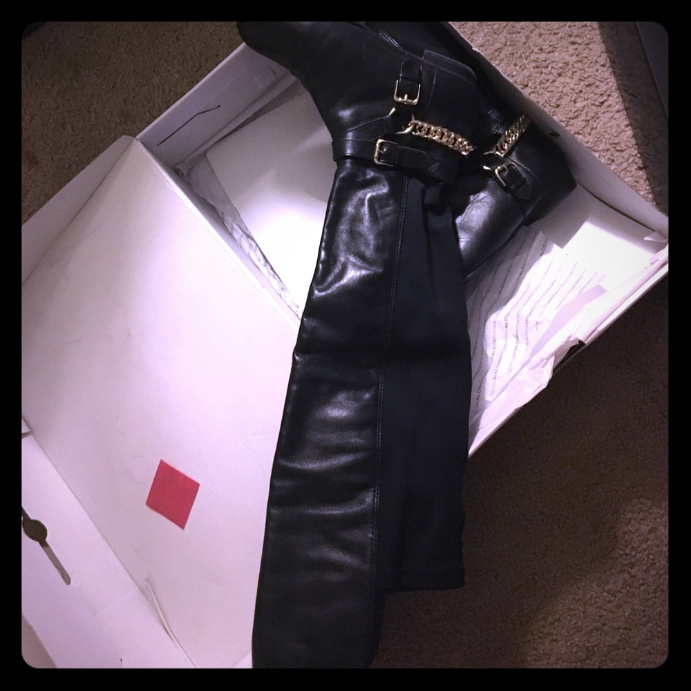 Over the knee flat boots