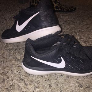 Black Nike running shoes