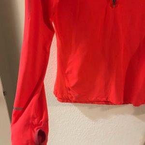 Salmon colored Nike jacket