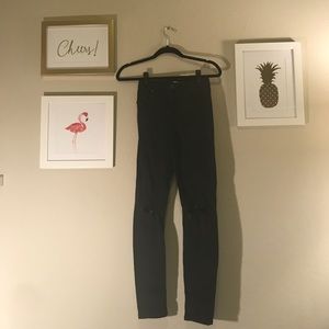 Topshop Jamie black ripped leggings.