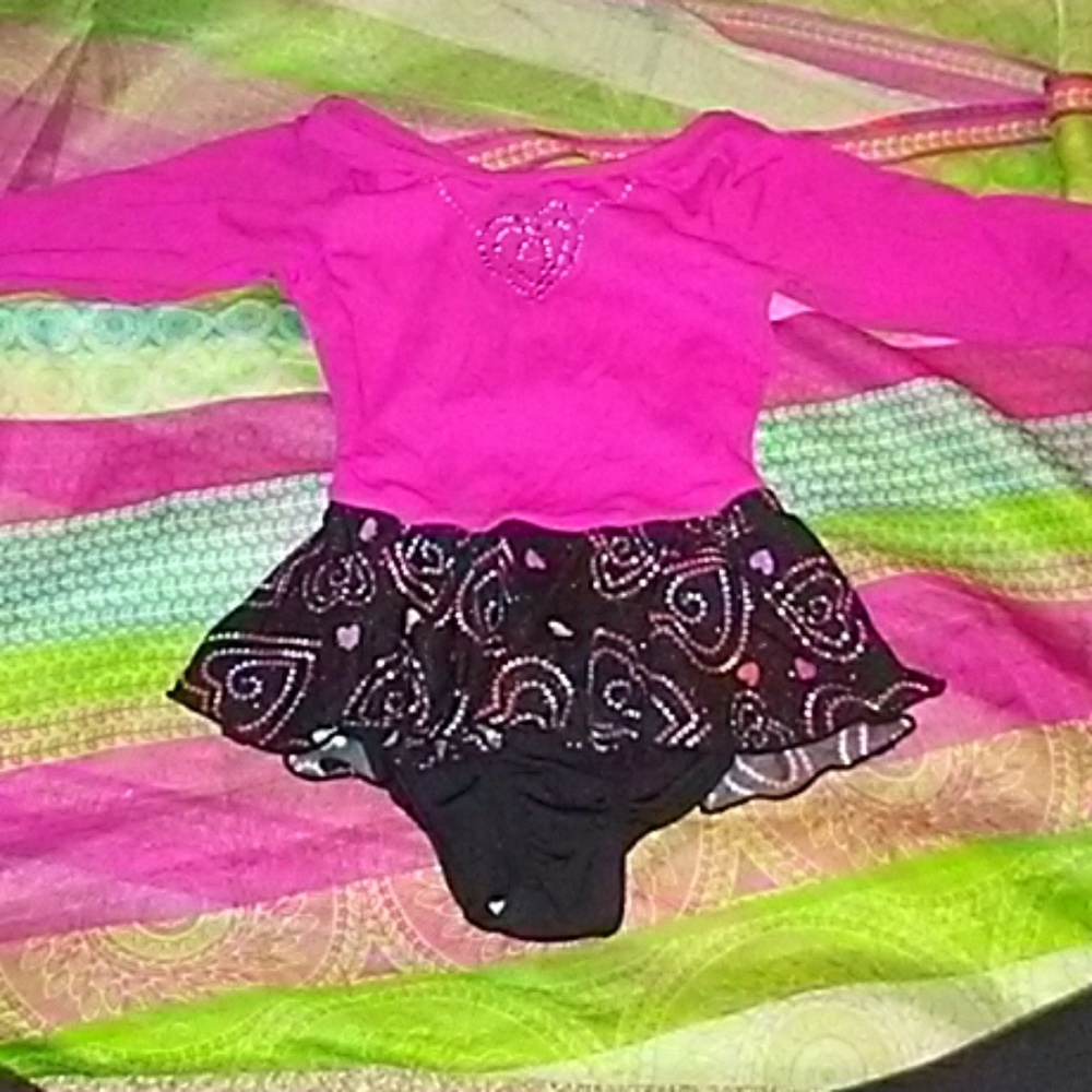 **TWO GENTLY USED CHILD LEOTARDS**