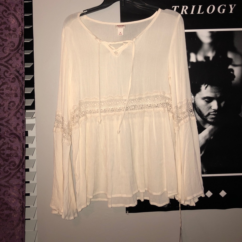 cute white bell sleeve top with lace cut out