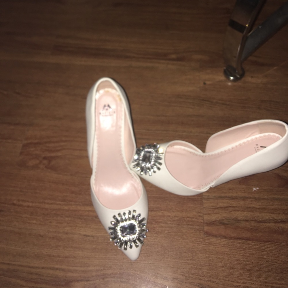 Brand new never worn white with jeweled toe pumps