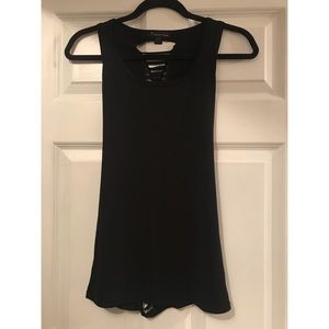 Black tank with cut-outs down the back middle. New