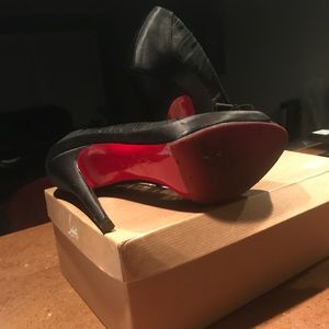 Christian louboutin peep toe pumps