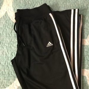 Black Adidas track pants
