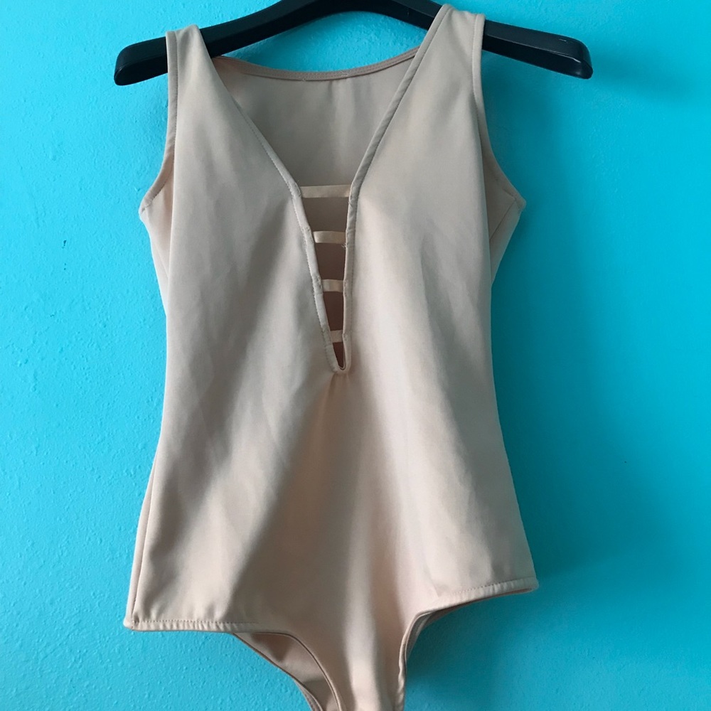 Peach leotard cut out front