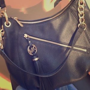 Micheal Kors leather cross bag