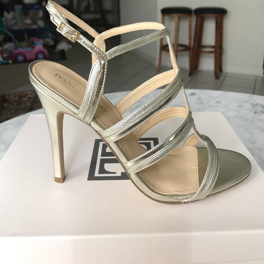 Ivanka Trump golden leather sandals