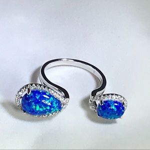 Silver ring with opal stones