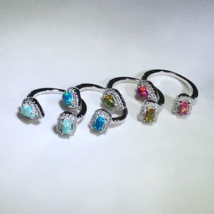 Silver ring with opal stones. pink and yellow