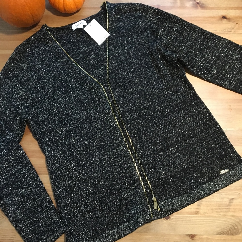 Calvin Klein . Black w. Gold thread .Gold Zip .NWT