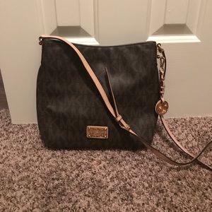 Michael Kors satchel with signature print.