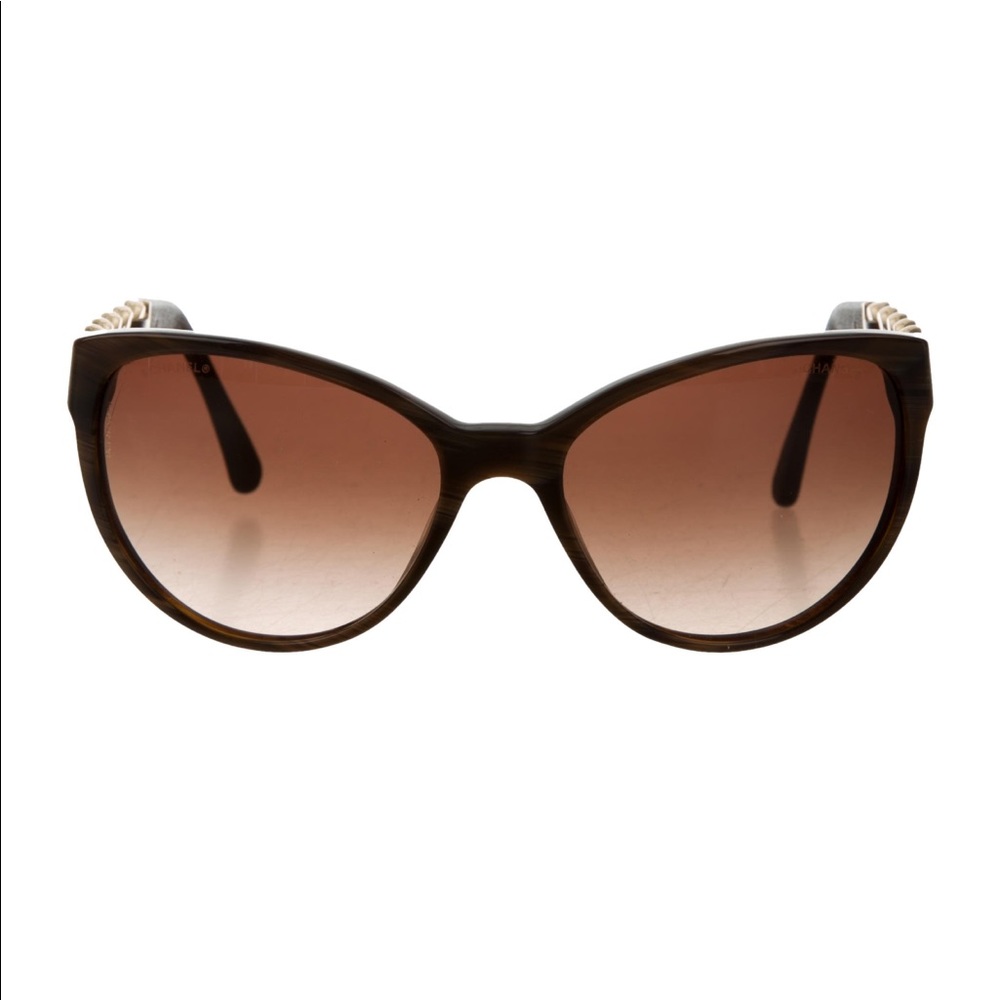 Chanel gold chain sunglasses.