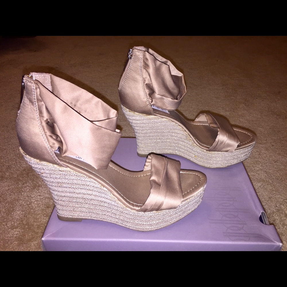 Jennifer Lopez mocha strap platforms, size 7.5