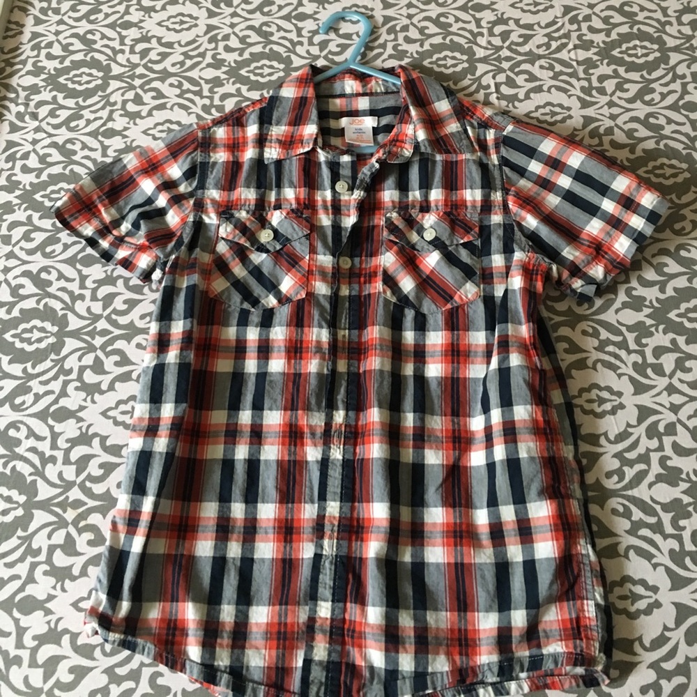 Boys orange and blue plaid button up shirt.