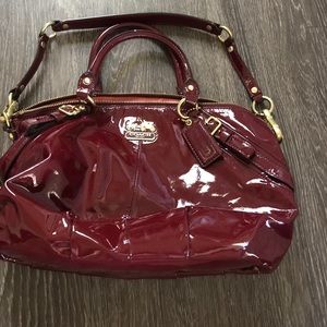 Burgundy coach patent leather bag