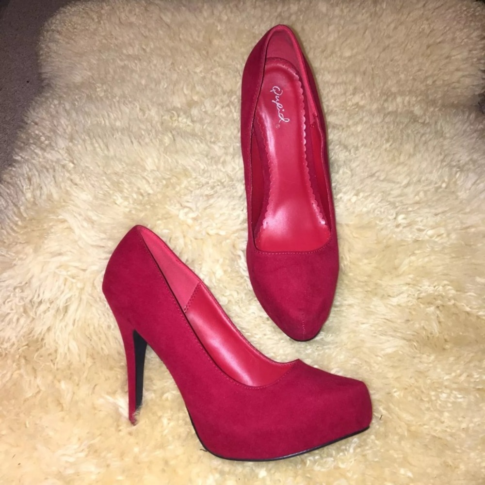 Red suede high heels