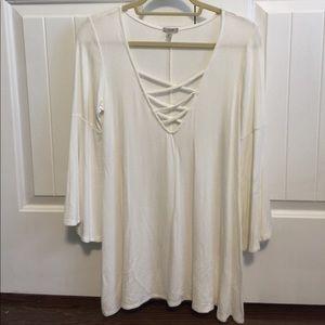 Stylish white blouse with crisscross front detail!