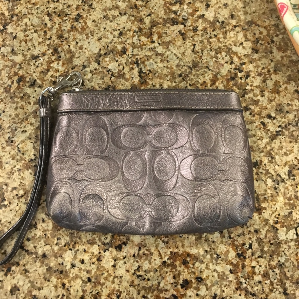 Coach small silver wristlet