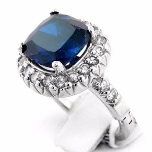 Sapphire ring with diamonds and a large center