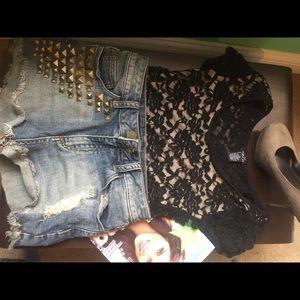 Lace top, suede pumps and rocker shorts