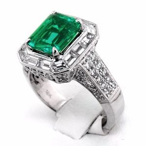 Emerald ring with beautiful and bright diamonds