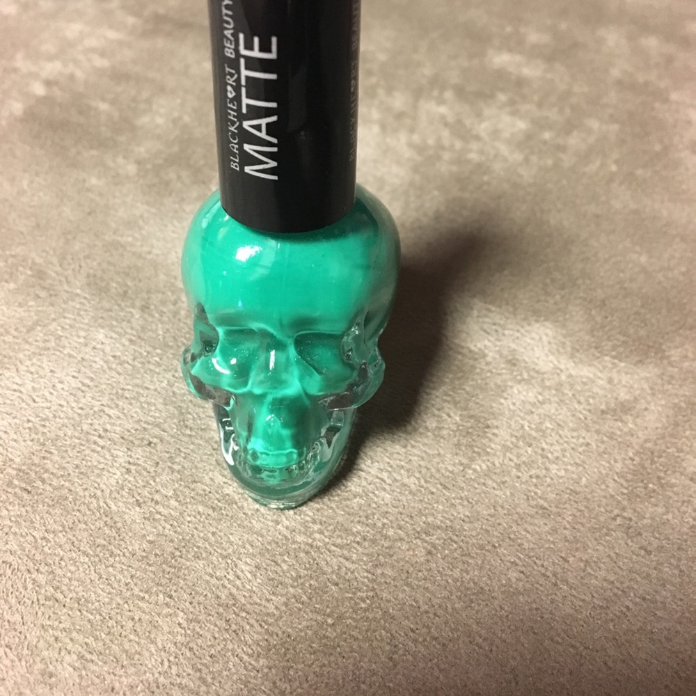Green nail polish. Never used.