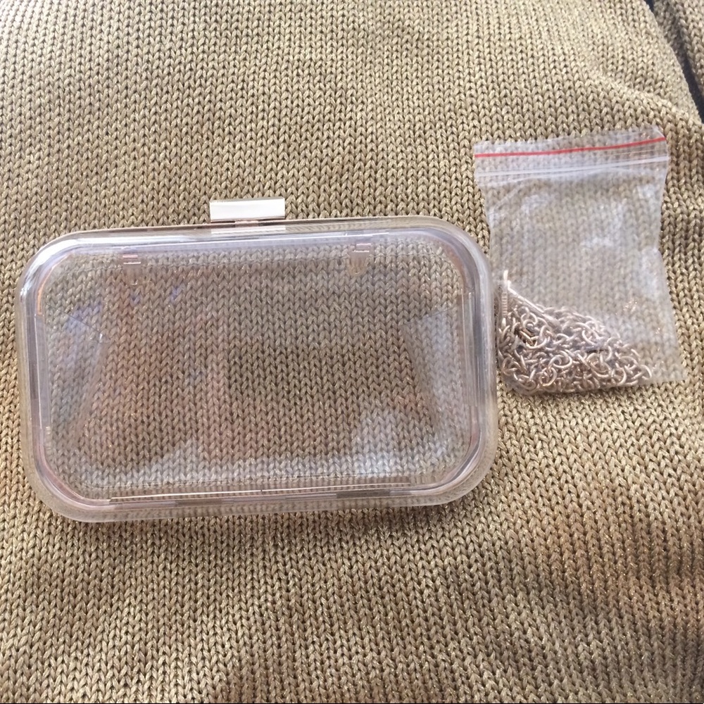 Clear and gold clutch