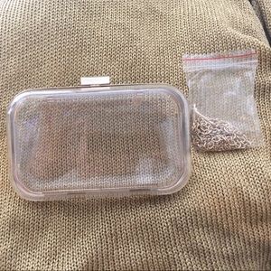 Clear and gold clutch