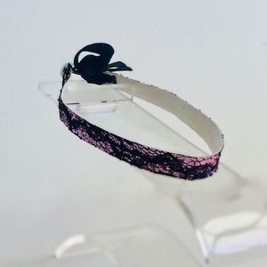 Choker with pink sparkles and black lace design
