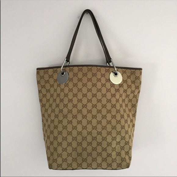 Gucci Handbags - Authentic Gucci Eclipse Canvas GG Tote