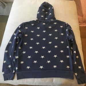blue hoodie with white stars