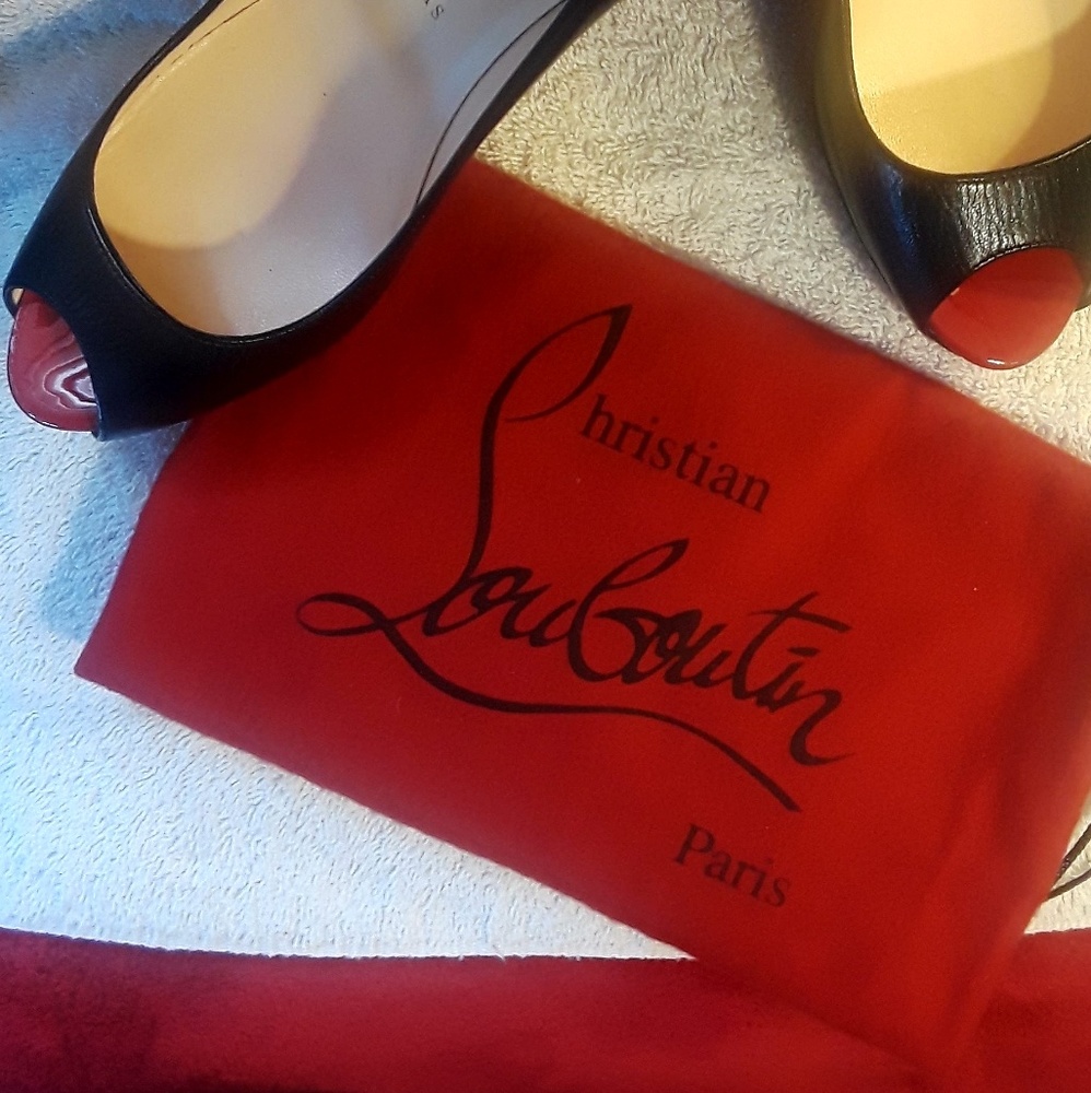 Classic Christian Louboutin peep toe pumps