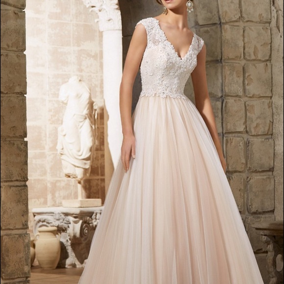 Madeline Gardner Dresses & Skirts - Brand new never worn wedding dress