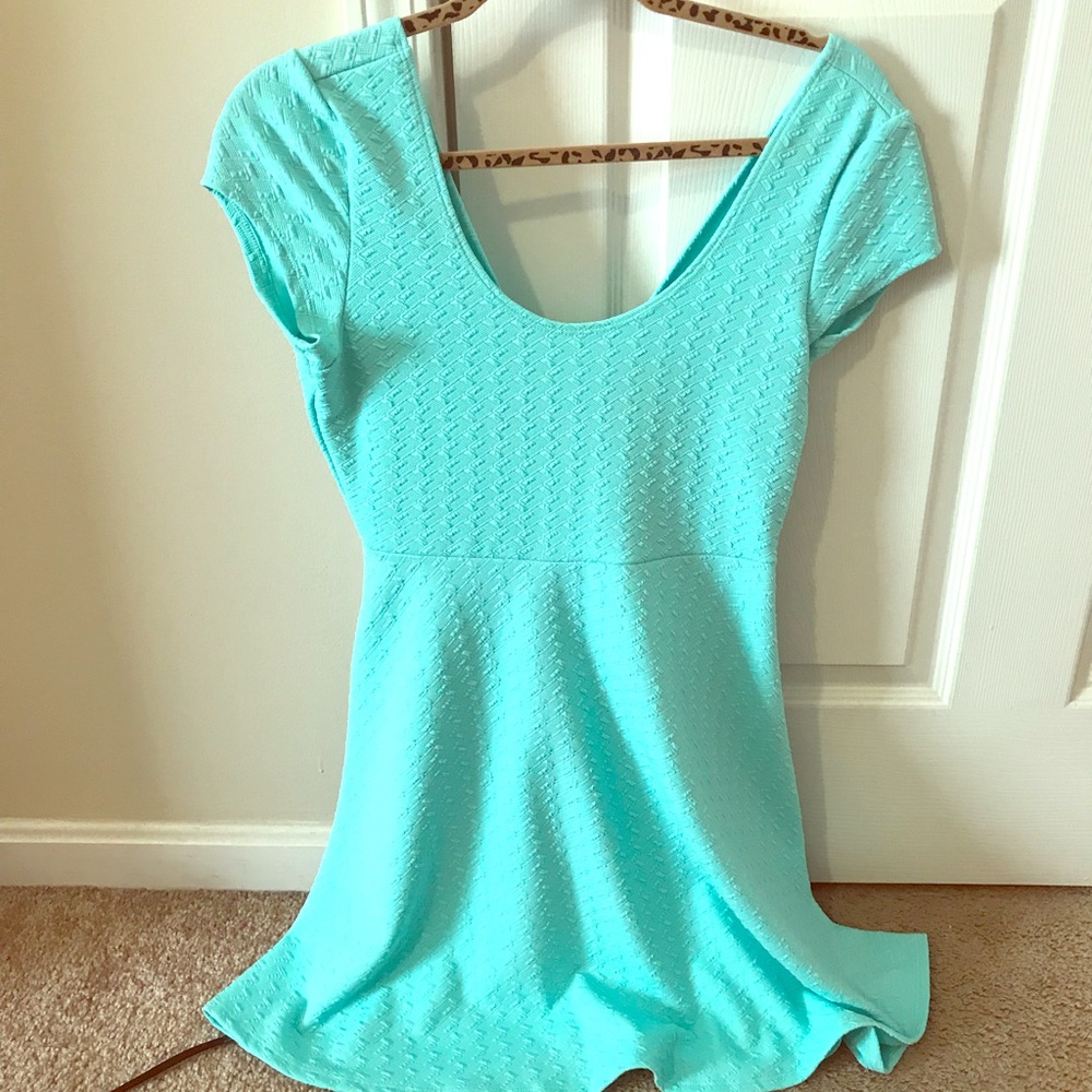 Aqua, partially open back dress!