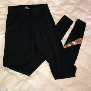 Nike leggings w/ rose gold symbol