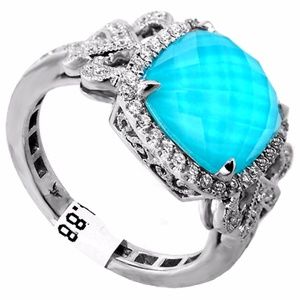 Turquoise Ring surrounded by .32ct of Diamonds 18k