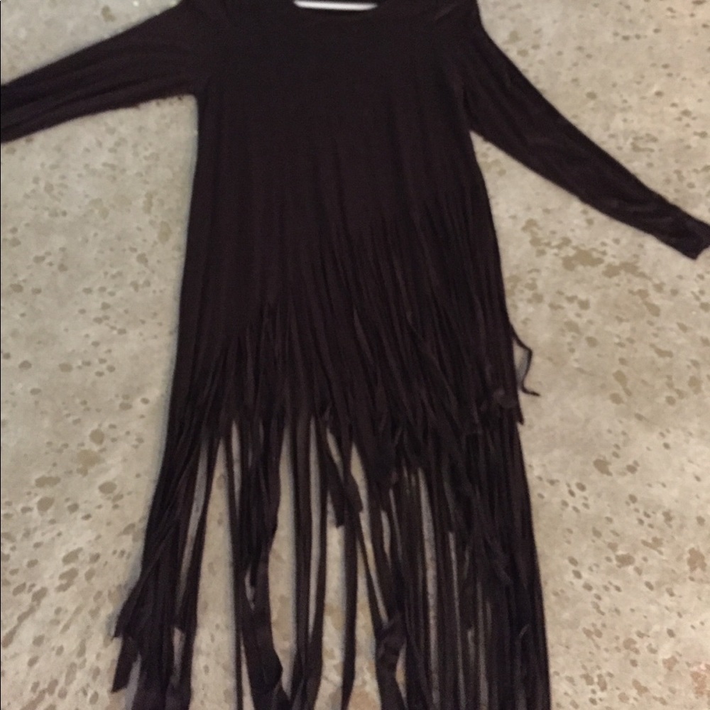 Who doesn’t LOVE fringe .. super cute fringe top!