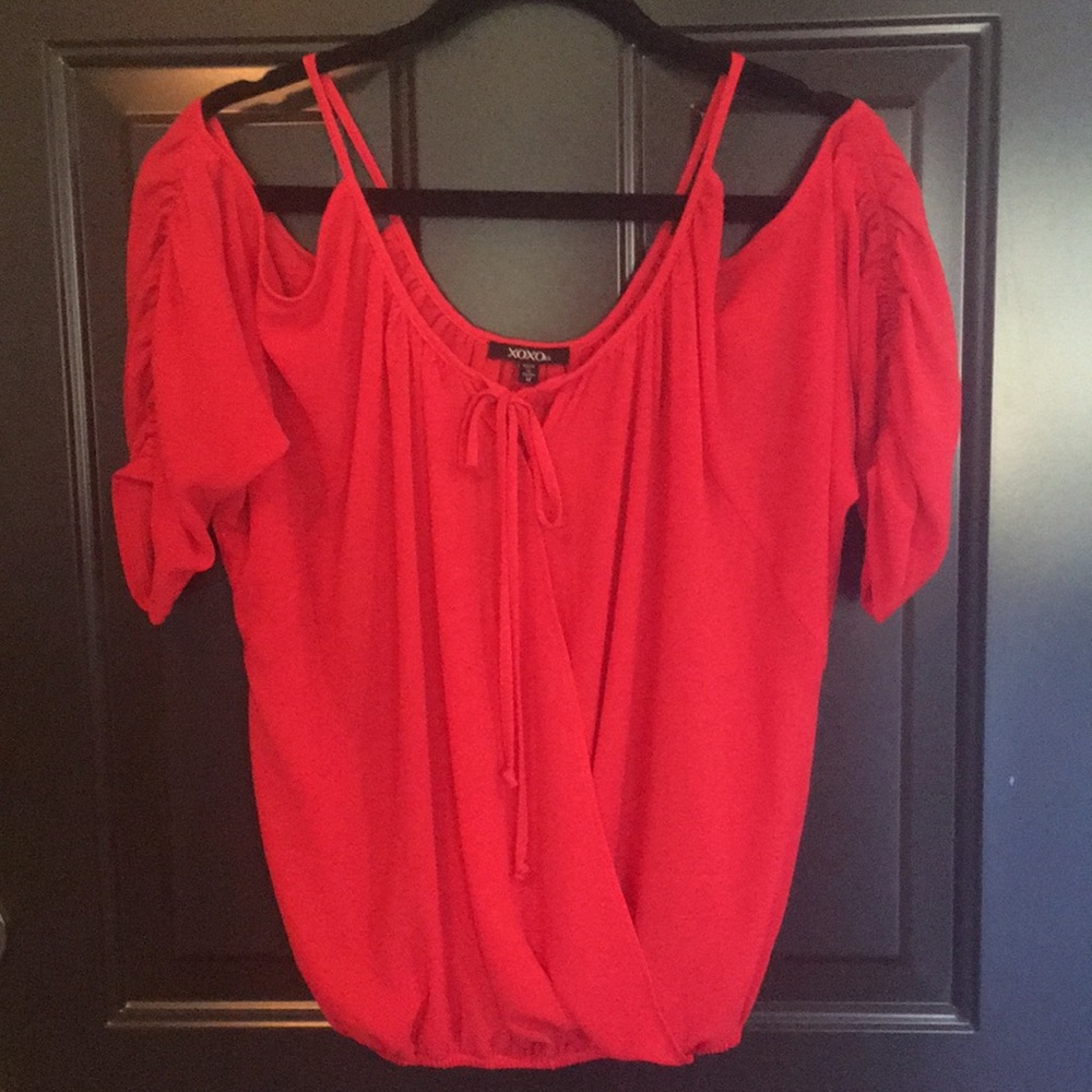 Never warn medium open shoulder blouse.