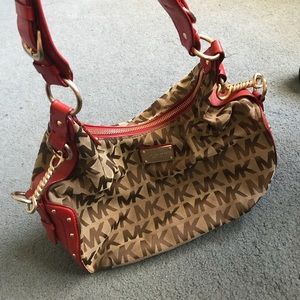 Red Michael Kors handbag