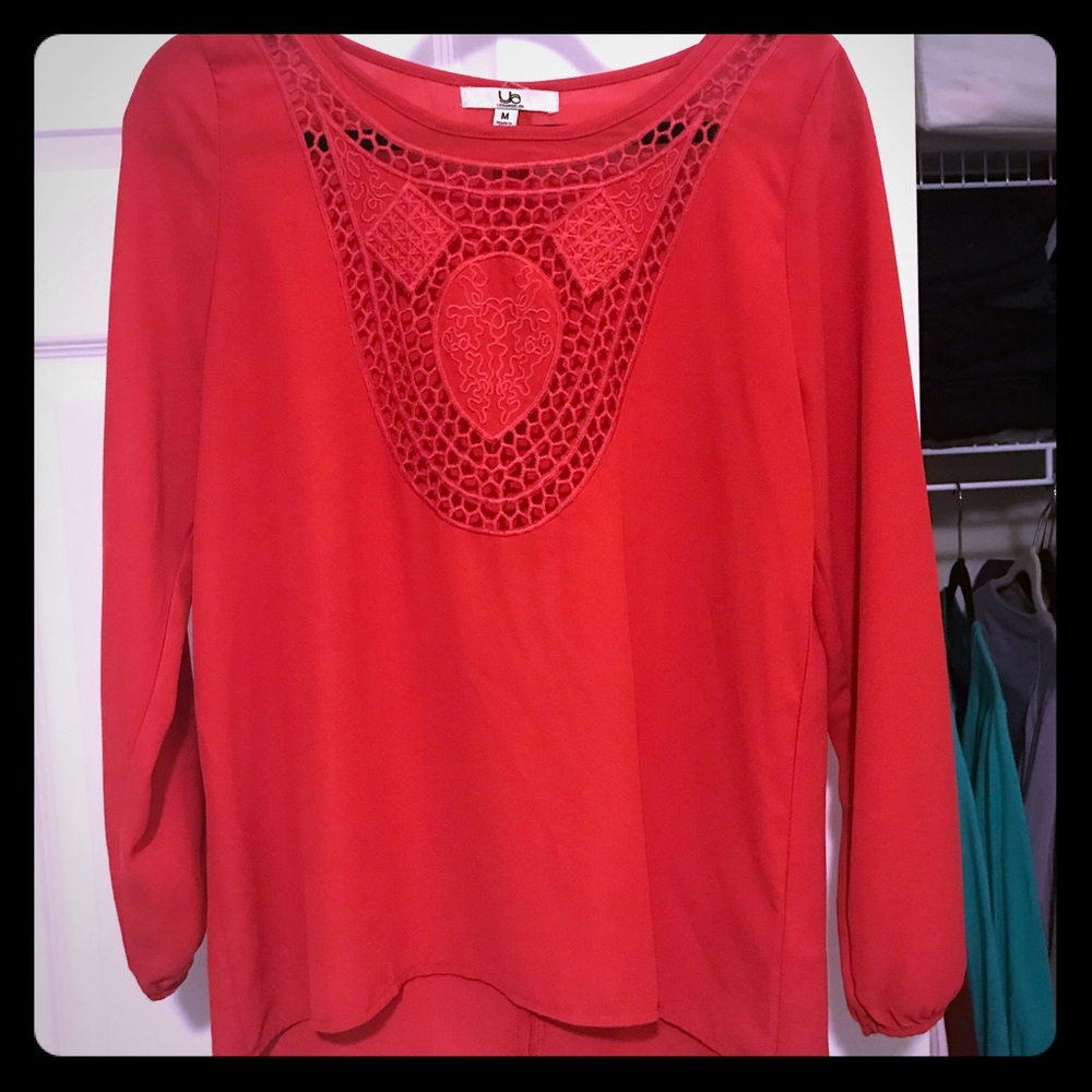 Red blouse, with crochet front. Gently worn.