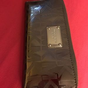 Michael Kors Jet Setter wallet. Price negotiable