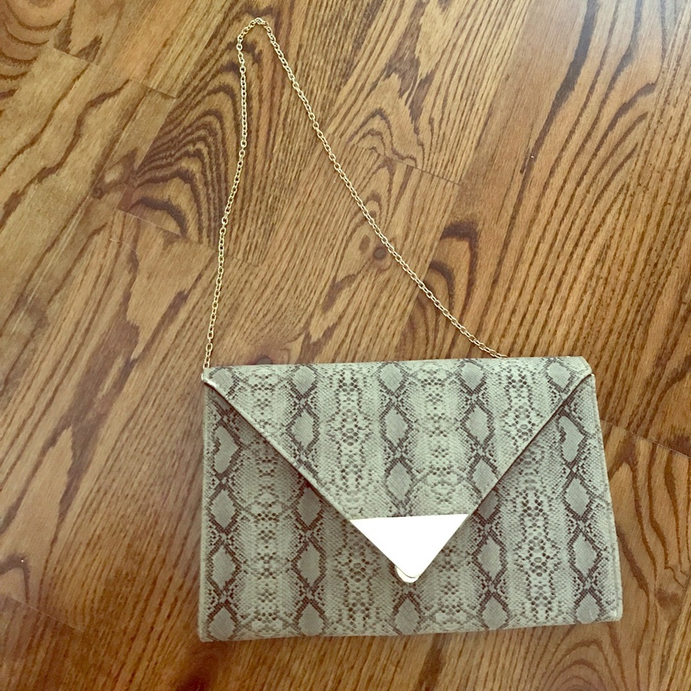 Saks snakeskin print clutch