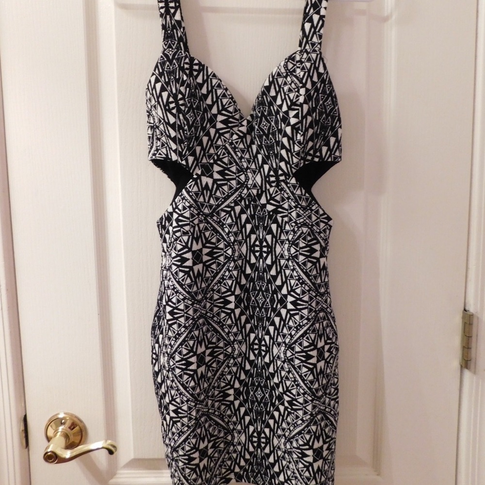 Mini dress with cut outs on the sides